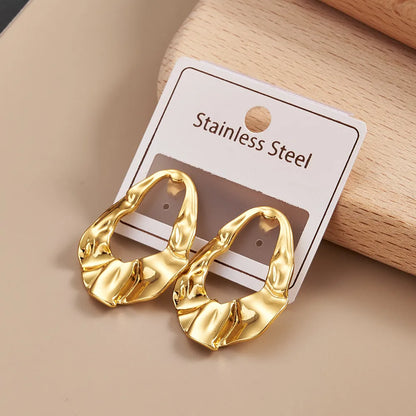 Sculpted Heart Form Gold Stud Earrings